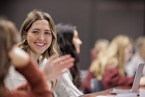 Female student smiling in classroom